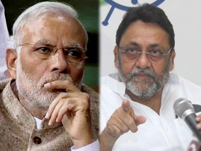 NCP Nawab Malik Slams Narendra Modi Over modi photo on vaccination certificate | "...तर मोदीजी नोटेवरून गांधींचा फोटो हटवून स्वतःचा फोटो छापतील", नवाब मलिकांचा सणसणीत टोला NCP Nawab Malik Slams Narendra Modi Over modi photo on vaccination certificate | "...तर मोदीजी नोटेवरून गांधींचा फोटो हटवून स्वतःचा फोटो छापतील", नवाब मलिकांचा सणसणीत टोला