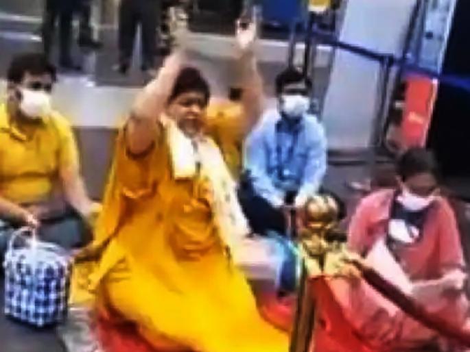 usha thakur is seen worshiping without wearing mask strange way for minister to drive away corona | अरे देवा! कोरोनाला पळवण्यासाठी भाजपा मंत्र्याने मास्क न लावता थेट विमानतळावरच केली पूजा, शोधला अनोखा फंडा usha thakur is seen worshiping without wearing mask strange way for minister to drive away corona | अरे देवा! कोरोनाला पळवण्यासाठी भाजपा मंत्र्याने मास्क न लावता थेट विमानतळावरच केली पूजा, शोधला अनोखा फंडा