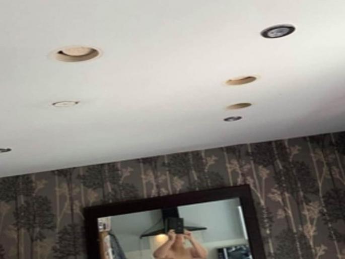 Uk woman accidentally sent photo without clothes to plasterers with broken kitchen ceiling | Woman sent photo without clothes : बोंबला! तिला कारागिरांना पाठवायचा होता तुटलेल्या छताचा फोटो; कॅमेरात काहीतरी भलतंच कैद झालं, अन् मग... Uk woman accidentally sent photo without clothes to plasterers with broken kitchen ceiling | Woman sent photo without clothes : बोंबला! तिला कारागिरांना पाठवायचा होता तुटलेल्या छताचा फोटो; कॅमेरात काहीतरी भलतंच कैद झालं, अन् मग...