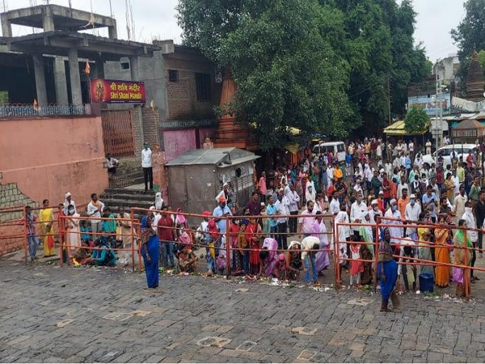 Devotees also took darshan of Vaidyanatha's steps on the second Shravan Monday | दुसऱ्या श्रावण सोमवारीही भाविकांनी घेतले वैद्यानाथाच्या पायरीचे मनोभावे दर्शन Devotees also took darshan of Vaidyanatha's steps on the second Shravan Monday | दुसऱ्या श्रावण सोमवारीही भाविकांनी घेतले वैद्यानाथाच्या पायरीचे मनोभावे दर्शन