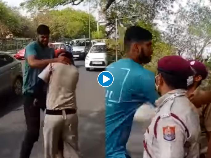 man attacks Delhi civil defence jawan because he ask to use a mask, video goes viral | सिव्हिल डिफेन्सच्या जवानासोबत युवकाची हुज्जत; मान ओढत म्हणला, 'तोडकर रख दूंगा', कारण... man attacks Delhi civil defence jawan because he ask to use a mask, video goes viral | सिव्हिल डिफेन्सच्या जवानासोबत युवकाची हुज्जत; मान ओढत म्हणला, 'तोडकर रख दूंगा', कारण...