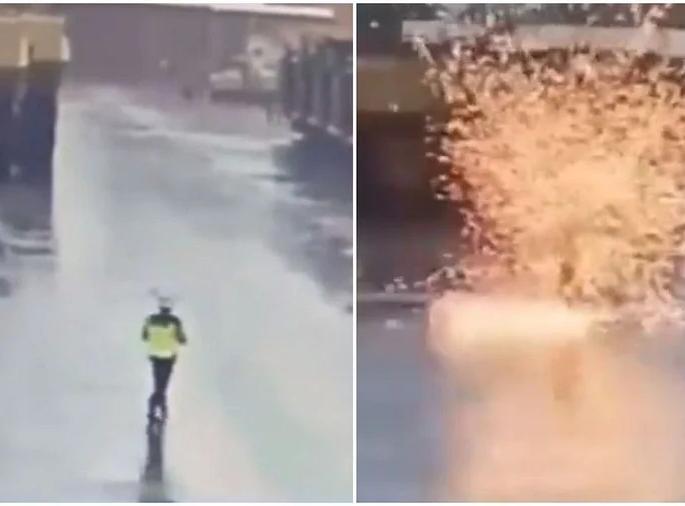 Lightning strikes a person walking on the road, flames fly, but the person is still alive | रस्त्यावरून चालत असलेल्या व्यक्तीच्या अंगावर कोसळली वीज, उडाला आगीचा लोळ, तरीही ती व्यक्ती राहिली जिवंत Lightning strikes a person walking on the road, flames fly, but the person is still alive | रस्त्यावरून चालत असलेल्या व्यक्तीच्या अंगावर कोसळली वीज, उडाला आगीचा लोळ, तरीही ती व्यक्ती राहिली जिवंत