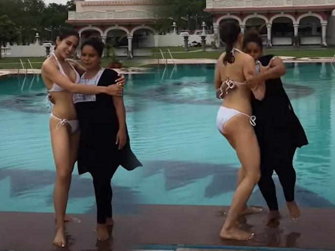 Viral Video : Sara ali khan pushed spot girl into swimming pool people trolled her brutally | Viral Video : बिकिनी घातलेल्या सारा खाननं स्पॉट गर्लला मुद्दाम पाण्यात ढकललं? व्हिडिओ पाहून नेटिझन्स भडकले