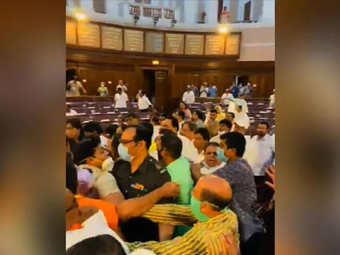 BJP-Trinamool MLAs clash in West Bengal Assembly, video goes viral | पश्चिम बंगालच्या विधानसभेत राडा, भाजपा-तृणमूल आमदारांमध्ये तुफान हाणामारी, व्हिडीओ व्हायरल   BJP-Trinamool MLAs clash in West Bengal Assembly, video goes viral | पश्चिम बंगालच्या विधानसभेत राडा, भाजपा-तृणमूल आमदारांमध्ये तुफान हाणामारी, व्हिडीओ व्हायरल