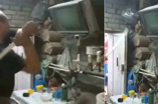 man fix tv with stick indian jugaad funny video viral on social media | देसी जुगाड! बंद पडलेला TV सुरू करण्यासाठी 'त्याने' हातात काठी घेतली अन्...; Video तुफान व्हायरल