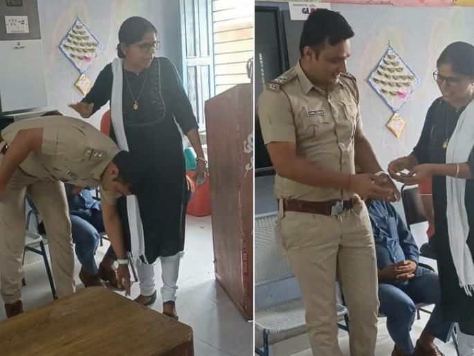 viral video police officer reached in his school teacher gave reward of rs 1100 in class | हृदयस्पर्शी! पोलीस अधिकारी होताच शाळेत पोहोचला तरुण; शिक्षिकेने बक्षीस म्हणून दिले 1100 रूपये viral video police officer reached in his school teacher gave reward of rs 1100 in class | हृदयस्पर्शी! पोलीस अधिकारी होताच शाळेत पोहोचला तरुण; शिक्षिकेने बक्षीस म्हणून दिले 1100 रूपये