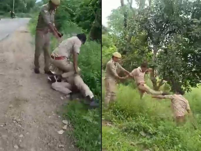 drunk constable and home guard in up kicked each other over sharing of money video | संतापजनक! नशेत तर्र पोलीस आणि होमगार्डमध्ये पैसे वाटपावरून हाणामारी, लाथाबुक्क्यांनी मारहाण drunk constable and home guard in up kicked each other over sharing of money video | संतापजनक! नशेत तर्र पोलीस आणि होमगार्डमध्ये पैसे वाटपावरून हाणामारी, लाथाबुक्क्यांनी मारहाण