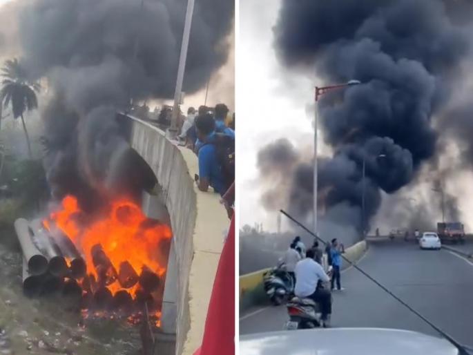 The water pipes suddenly caught fire; High volume of smoke due to coating, wood in pipe | उड्डाणपूलाखालील जलवाहिन्या अचानक पेटल्या; कोटिंग, पाइपमधील लाकडांमुळे धुराचे उंच लोट The water pipes suddenly caught fire; High volume of smoke due to coating, wood in pipe | उड्डाणपूलाखालील जलवाहिन्या अचानक पेटल्या; कोटिंग, पाइपमधील लाकडांमुळे धुराचे उंच लोट