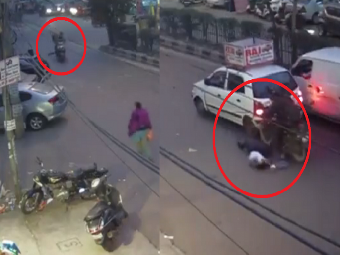 A mobile snatching incident reported in the Shalimar Bagh area of delhi | चोरट्यांनी महिलेचा फोन चोरला अन् तिला रस्त्याने फरफटत नेले, पाहा धक्कादायक VIDEO A mobile snatching incident reported in the Shalimar Bagh area of delhi | चोरट्यांनी महिलेचा फोन चोरला अन् तिला रस्त्याने फरफटत नेले, पाहा धक्कादायक VIDEO