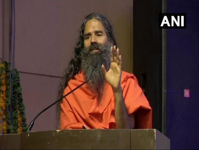 if anyone have more than 2 babies their voting right should be revoked says baba ramdev | दोनपेक्षा अधिक मुलांना जन्म देणाऱ्यांना मतदानाचा अधिकार नसावा - बाबा रामदेव if anyone have more than 2 babies their voting right should be revoked says baba ramdev | दोनपेक्षा अधिक मुलांना जन्म देणाऱ्यांना मतदानाचा अधिकार नसावा - बाबा रामदेव