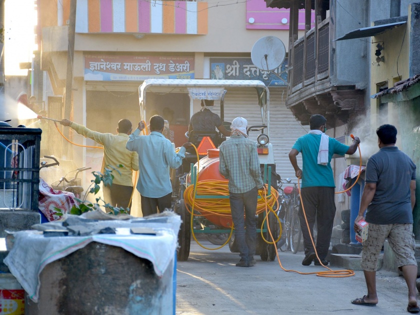 Spraying at Munjwad | मुंजवाड येथे फवारणी