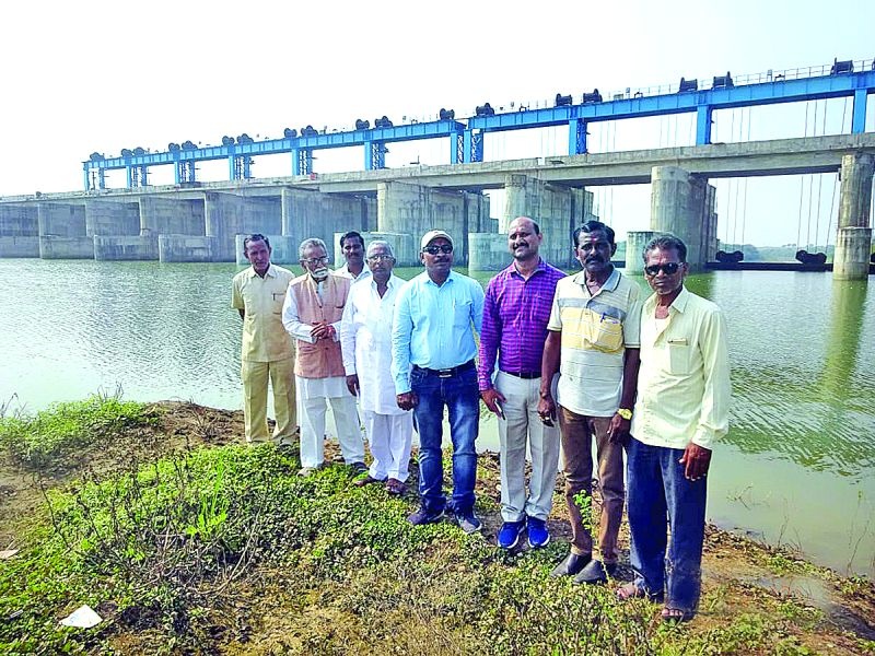 Water Resources in Ner-Dhamana Barrage; Irrigation Conflict Committee worship | नेर-धामणा बॅरेजमध्ये जलसंचय; जलसिंचन संघर्ष समितीने केले जलपूजन