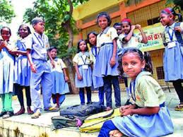 Distribution of school uniforms at Devgaon | देवगांव येथे शालेय गणवेश वाटप