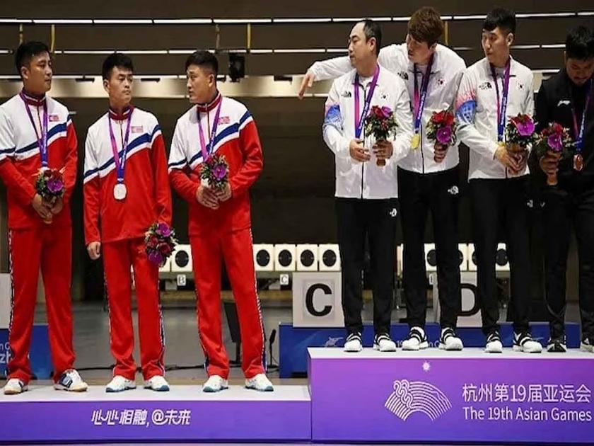 Asian Games: Something that North Korean athletes did as soon as they won the gold medal, then... | Asian Games: सुवर्णपदकाने हुलकावणी देताच उत्तर कोरियाच्या क्रीडापटूंनी केलं असं काही, त्यानंतर...