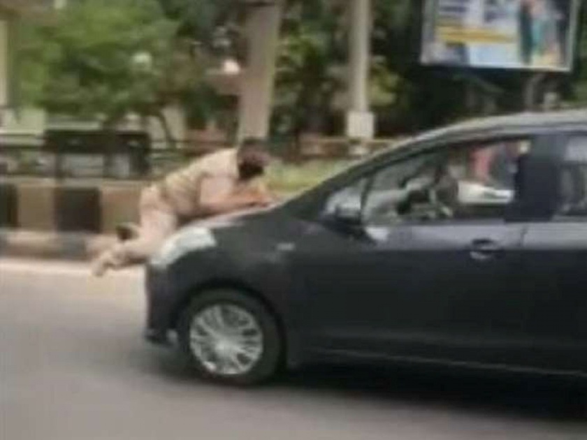 CoronaVirus Lockdown Man Drags Police Officer on Cars Bonnet in punjab kkg | VIDEO: धक्कादायक! गाडी रोखणाऱ्या पोलिसाला बोनेटवर टाकून 'तो' सुस्साट सुटला अन्...