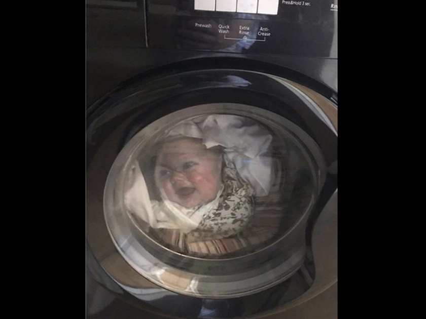 Dad has fright wife washes a t-shirt baby face on viral photo | पत्नी धुवत होती कपडे...वॉशिंग मशीन पाहून बाळाचा पिता झाला सुन्न, पण यात आहे एक ट्विस्ट....