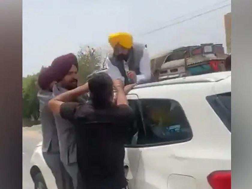 Agneepath protester stop the Punjab Chief Minister Bhagwant Mann's SUV aam aadmi party tweet video punjab chief minister bhagwant mann convoy | 'अग्निपथ' आंदोलकाने पंजाबचे मुंख्यमंत्री भगवंत मान यांची SUV रोखली; बघा मग काय घडलं