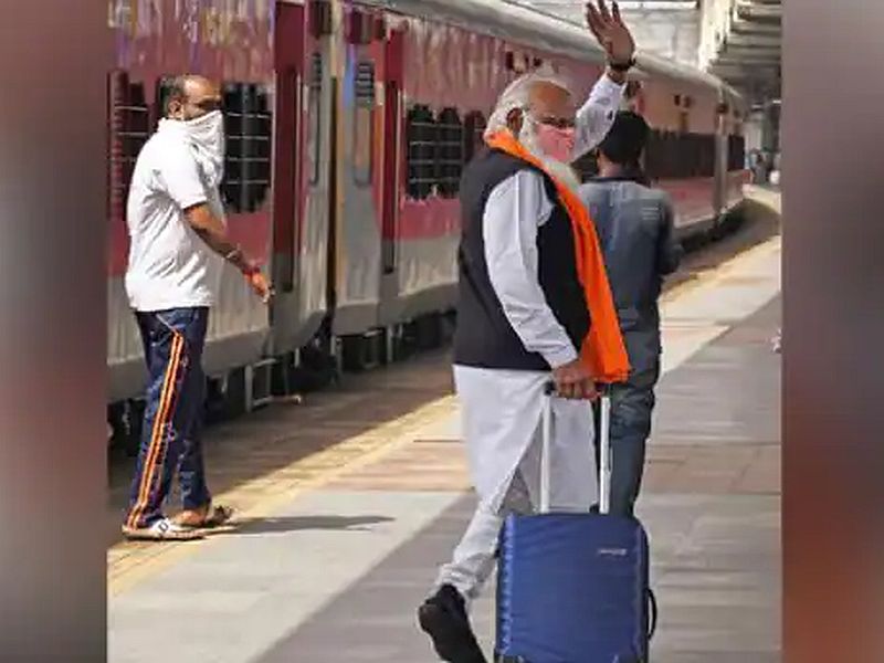 Mumbai Viral News lalaji devaria resembles PM Narendra Modi waves at dadar station | हातात बॅग घेऊन पंतप्रधान 'मोदी' ट्रेननं कुठे निघाले...? आपणही फसलात ना...?