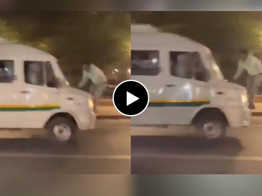delhi video of man dragged on a mini bus bonet for servel meters video goes viral om social media  | धक्कादायक! बसच्या बोनेटवर व्यक्तीला लटकवत चालक सुसाट; राजधानी दिल्लीतील घटना