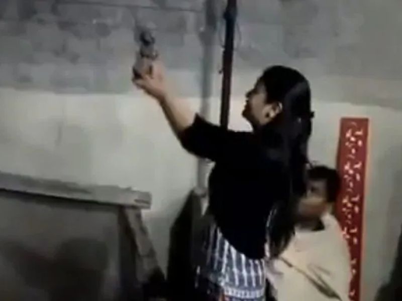 noida family celebrates diwali with revolver ladies kids also fire rounds | Video-फटाक्यांऐवजी 'या' परिवारानं गोळीबार करत साजरी केली दिवाळी