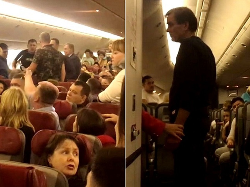 Drunk passenger attempts to open Airplane door when plan at 33000 feet watch viral video | Video : ३३ हजार फूट उंचीवर होतं विमान अन् नशेत व्यक्ती उघडू लागला दरवाजा....