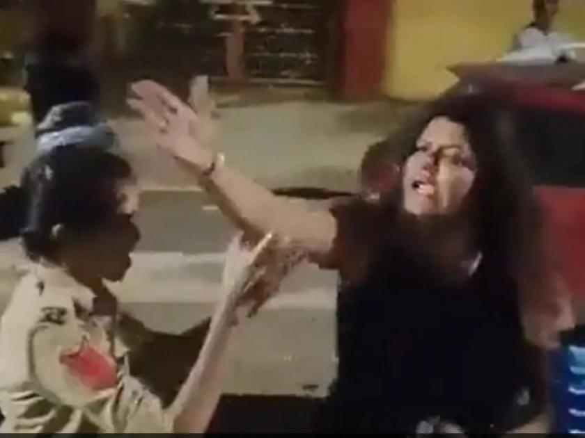 Video gujarat drunk woman attacking and abusing cops arrested | Video - गुजरातमध्ये दारुच्या नशेत महिलेचा रस्त्यावर हायव्होल्टेज ड्रामा; पोलिसांवर केला हल्ला