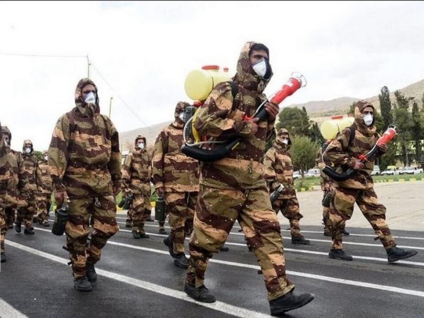 Iranian army day different sight parade of medical equipment removed soldiers seen in PPE kit | संचलनात क्षेपणास्त्रांच्या जागी मोबाईल दवाखाने; इराणचा सैन्यदिन अनोख्या पद्धतीने