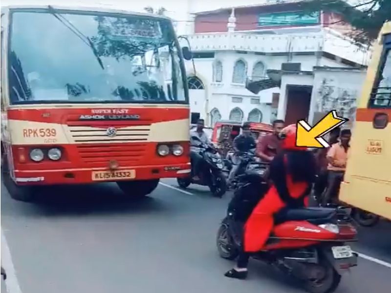 Video: The video was taught by a woman, not by a policeman, who broke the traffic rules | Video: वाहतुकीचे नियम मोडणाऱ्या बस चालकाला पोलिसांनी नाही, तर महिलेने शिकवला धडा