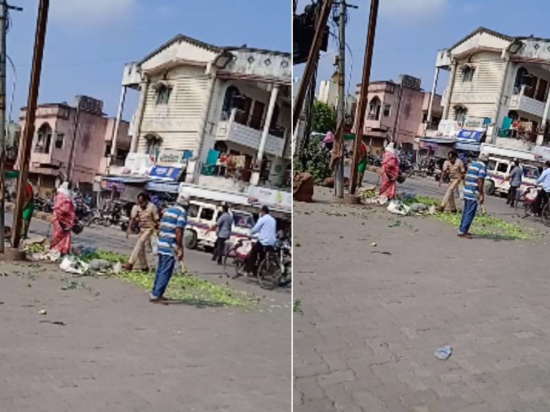 Police sub inspector throws vegetables from a woman shopkeepers shop on the street Video goes viral | पोलीस उपनिरीक्षकानं महिला दुकानदाराची भाजी रस्त्यावर फेकली, Video व्हायरल; चौकशीचे आदेश 