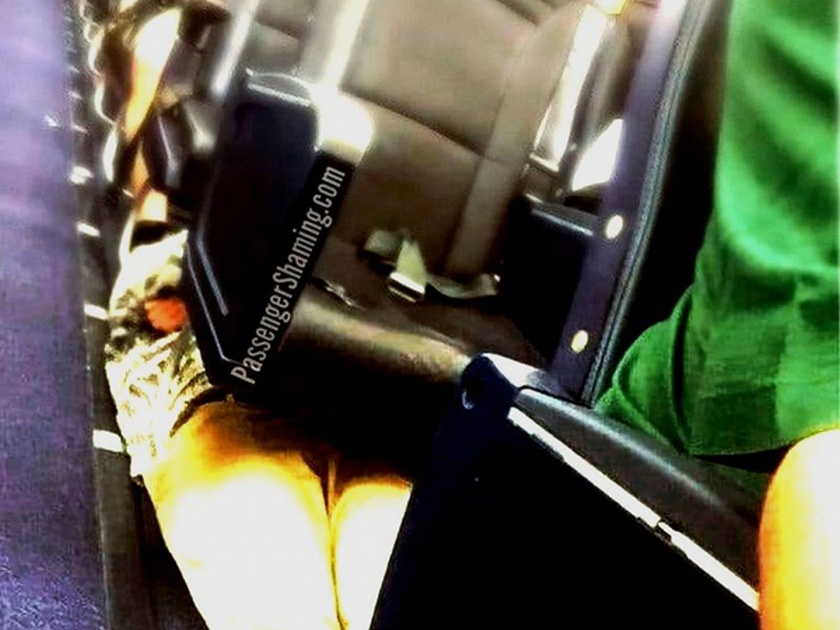 Passenger lying below plane seats divides internet viral photo | विमानात 'त्याने' केला असाकाही कारनामा; लोक म्हणाले, अखेर हे झालं कसं काय?