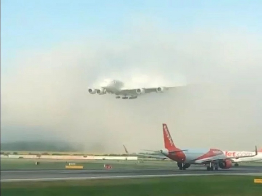 Emirates aircraft made a grand entry by tearing the clouds video viral | Video : विमानाची एअरपोर्टवर दमदार एन्ट्री, एकदा बघाल बघतच रहाल!