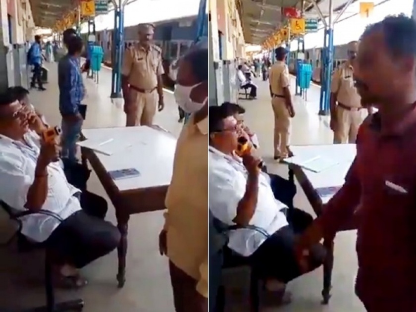 Officer testing Indian railways passengers irresponsibility video viral api | Video : फोनवर बोलत अन् खुर्चीवर आारामात बसून 'कोरोना'ची तपासणी, व्हिडीओ व्हायरल!