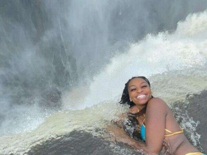 Watch viral video of girl dangled over 1640ft waterfall | आता बोला! 'या' तरूणीचा कारनामा पाहून तुम्ही चक्रावून जाल अन् स्वत:च्या कपाळावर मारून घ्याल हात...