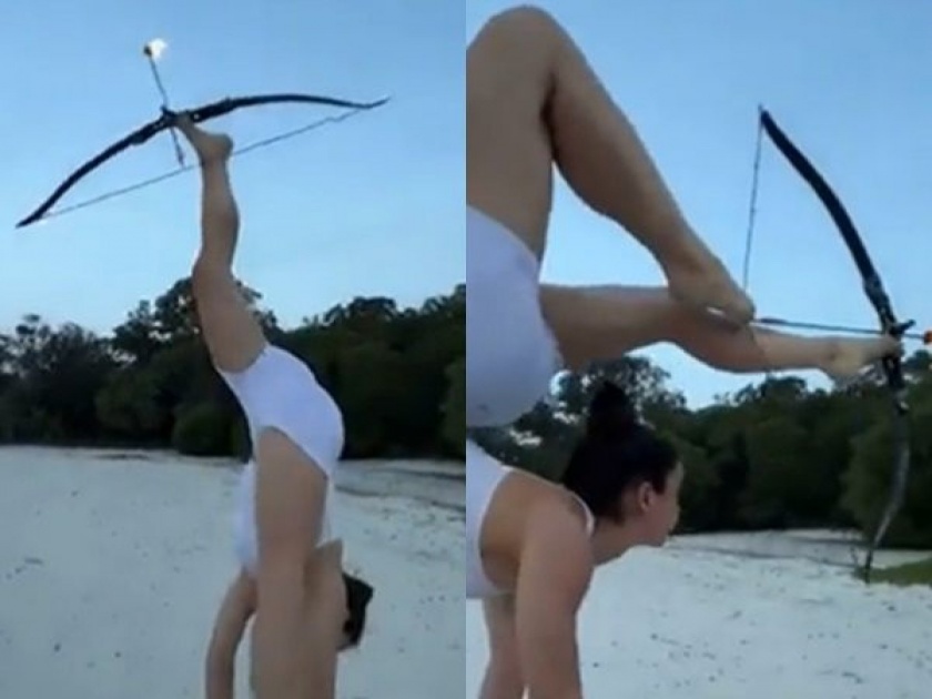 Girl was doing archery with legs showing her flexibility video will shock you | VIDEO : पायांनी मारला बाण तरी निशाण्यावर लागला, तरूणीची गजब तिरंदाजी पाहून चक्रावून जाल
