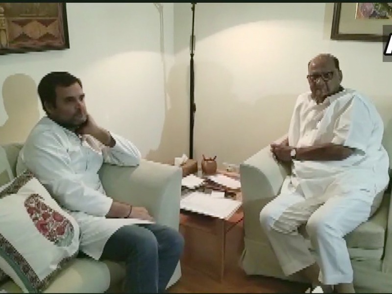 Congress President Rahul Gandhi meets NCP leader Sharad Pawar at Pawar's residence in Delhi. | पर्याय नसताना मैदान सोडणे योग्य नाही; शरद पवारांनी राहुल गांधीचे कान टोचले!