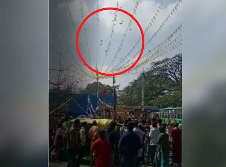 random person stood on flyover in bangalore threw 10 rs notes viral video | Video - फ्लायओव्हरवर उभा राहिला अन् नोटांचा वर्षाव सुरू केला; पैसे गोळा करायला लोकांची झुंबड