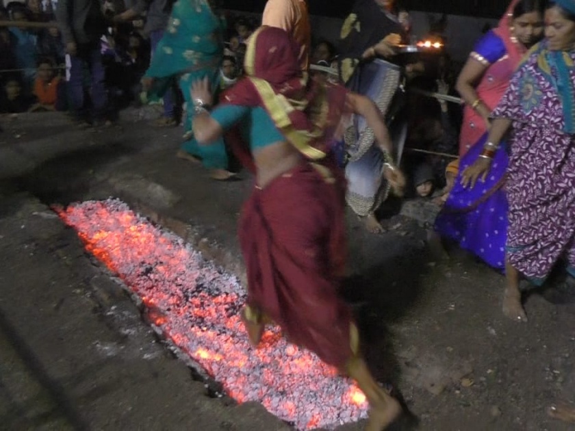 The practice of walking on the burning fire | धगधगत्या निखाऱ्यांवर चालून नवस फेडण्याची प्रथा!