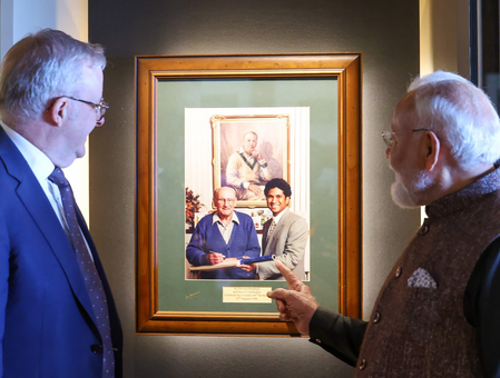 old photo of their meeting during MCG visit