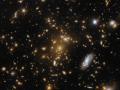 Hubble telescope images light-bending galaxy cluster - Hindi News | Hubble telescope images light-bending galaxy cluster | Latest technology News at Lokmattimes.com