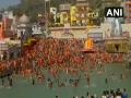 Thousands of devotees take 'Shahi Snan' in Ganga on Mahashivratri 2021 - Hindi News | Thousands of devotees take 'Shahi Snan' in Ganga on Mahashivratri 2021 | Latest lifestyle News at Lokmattimes.com