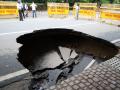 Portion of road caves in South Delhi - Hindi News | Portion of road caves in South Delhi | Latest national News at Lokmattimes.com