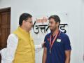 International shooter Shapath Bharadwaj felicitated by Uttarkhand CM Dhami - Hindi News | International shooter Shapath Bharadwaj felicitated by Uttarkhand CM Dhami | Latest other-sports News at Lokmattimes.com