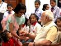 PM celebrates Raksha Bandhan with school girls - Hindi News | PM celebrates Raksha Bandhan with school girls | Latest politics News at Lokmattimes.com
