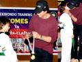SRK kisses AbRam, honours him with gold medal for winning Taekwondo tournament - Hindi News | SRK kisses AbRam, honours him with gold medal for winning Taekwondo tournament | Latest entertainment News at Lokmattimes.com