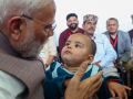 Overloaded with feelings, PM Modi meets infant Neetika orphaned in Himachal cloudburst tragedy - Hindi News | Overloaded with feelings, PM Modi meets infant Neetika orphaned in Himachal cloudburst tragedy | Latest national News at Lokmattimes.com
