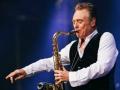 UB40 songwriter, sax player Brian Travers dies after battle with cancer - Hindi News | UB40 songwriter, sax player Brian Travers dies after battle with cancer | Latest entertainment News at Lokmattimes.com