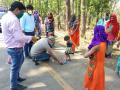 Slippers being distributed to migrants making their way via Chhattisgarh - Hindi News | Slippers being distributed to migrants making their way via Chhattisgarh | Latest national News at Lokmattimes.com