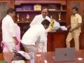 Telangana official triggers row by touching CM's feet - Hindi News | Telangana official triggers row by touching CM's feet | Latest politics News at Lokmattimes.com