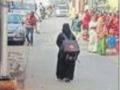 Woman with backpack - How a pic is changing her life - Hindi News | Woman with backpack - How a pic is changing her life | Latest national News at Lokmattimes.com