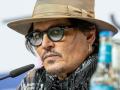 Johnny Depp looks disheveled as he's escorted out of hotel - Hindi News | Johnny Depp looks disheveled as he's escorted out of hotel | Latest entertainment News at Lokmattimes.com